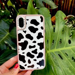 Casetify IPhone XS cow print and baby pink case